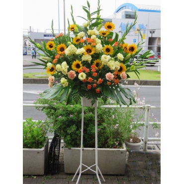 オレンジ系のスタンド花